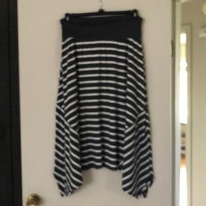 Asymmetrical  skirt with control top.